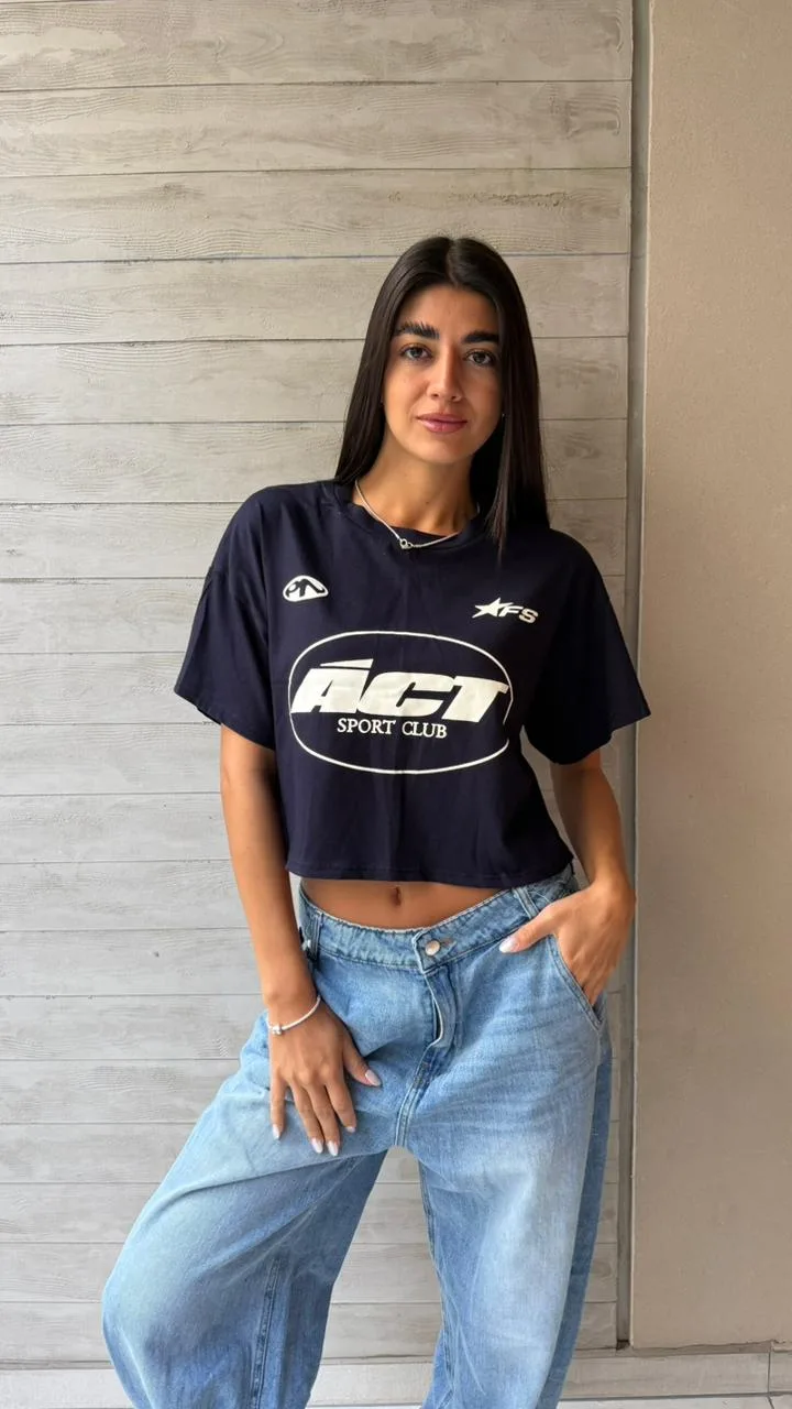 26/R15 - REMERA CROP "ACT" - JERSEY