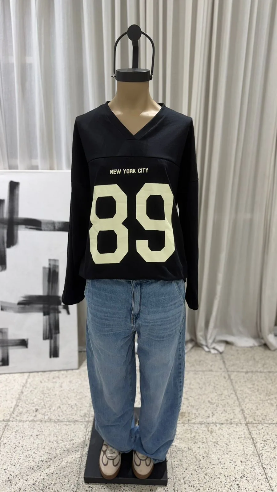 26/R23 - REMERA M/L CUELLO V"89" - JERSEY